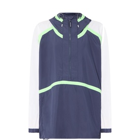 Free People Movement Midnight Navy colour-block anorak jacket with neon green trim, white shoulders, half-zip neck, and hood