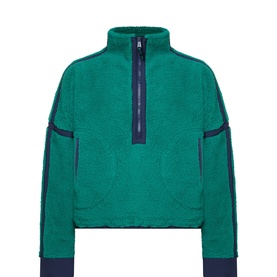 Free People Movement Green Glow sherpa fleece half-zip pullover with navy contrast side panels and ribbed cuffs
