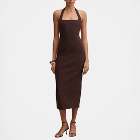 Model wearing Forever New chocolate halterneck midi dress with open back, styled with brown strappy heels and gold bangle