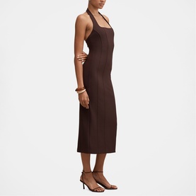 Model wearing Forever New chocolate halterneck midi dress with open back, styled with brown strappy heels and gold bangles