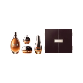 La Mer Genaissance De La Mer Anti-Ageing Skincare Gift Set, four amber-toned bottles and a jar with dark chocolate gift box