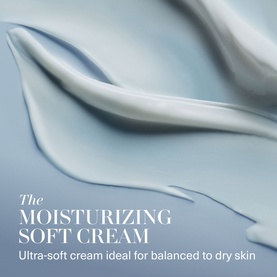 La Mer Moisturizing Soft Cream Hydration Gift Set; close-up of silky cream texture in soft blue-toned lifestyle shot