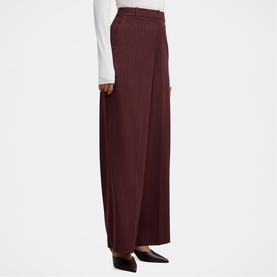 Model wearing Forever New berry pinstripe wide-leg trousers, styled with a white fitted top and black pointed-toe heels.