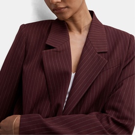 Model wearing Forever New berry pinstripe blazer with notched lapels, styled with white top visible at neckline.