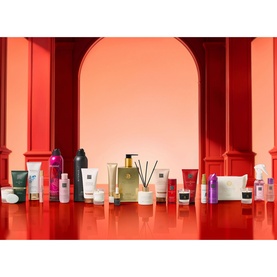 Rituals Premium Advent Calendar featuring assorted skincare, body and fragrance products displayed against a coral red backdrop