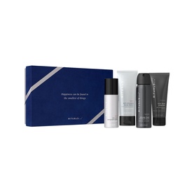 Rituals Homme Small Gift Set, navy blue gift box with four men's grooming products including spray, serum, and two tubes