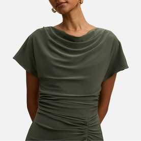 Model wearing Forever New Thyme Green cowl neck short sleeve dress with ruched waist detailing.