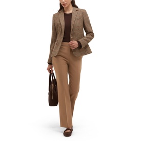 Model wearing Hobbs brown multi check blazer and wide-leg trousers, styled with a dark brown top and carrying a brown leather tote bag.