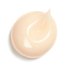 Chanel Ultimate Body Cream swatch showing smooth, peach-toned cream texture on white background