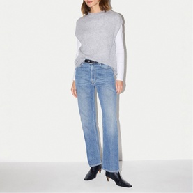 Model wearing Jigsaw Grey Melange knit vest over white long-sleeve top, styled with blue straight-leg jeans and black heeled boots.