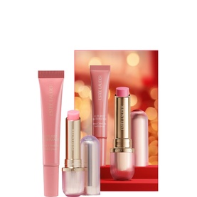 Estee Lauder Rosy Reception Futurist Blush & Balm Gift Set containing lip balm, gloss, and blush in pink shades, with festive red backdrop