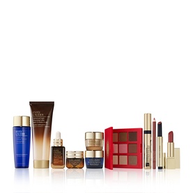 Est&eacute;e Lauder Train Case Blockbuster 12-Piece Gift Set featuring skincare, a red eyeshadow palette, lipstick, and makeup essentials