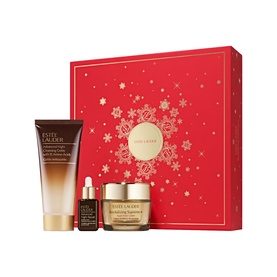 Estee Lauder Revitalizing Supreme+ Skincare Gift Set with cream, serum, and cleanser in festive red star-print box