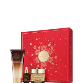 Estee Lauder Revitalizing Supreme+ Skincare Gift Set with cream, serum, and cleanser in festive red star-print box