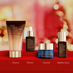 Est&eacute;e Lauder Advanced Night Repair Discovery Skincare Set featuring four products: cleanser, serum, moisturiser, and eye cream on red background.