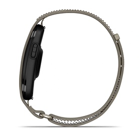 Side profile view of a smartwatch with dark case and silver-tone perforated metal mesh strap, showing slim profile and clasp detail