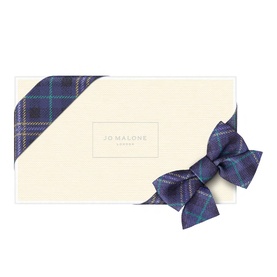 Jo Malone Christmas Edition Bestsellers Cologne Collection Gift Set in cream box with navy blue tartan ribbon and bow