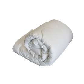 Karla Bree duvet in white, rolled and tied, showing quilted stitching detail