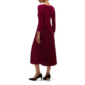 Model wearing Hobbs calla pink midi dress with pleated skirt and three-quarter sleeves, styled with black heels, back view.