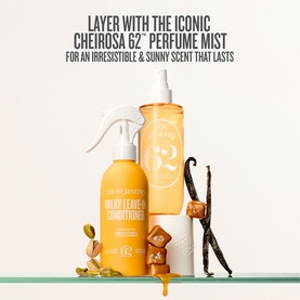 Sol De Janeiro Milky Leave-In Conditioner spray bottle styled with Cheirosa 62 Perfume Mist, vanilla pods and caramel pieces on shelf