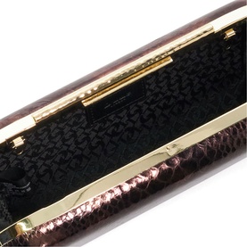 Dark burgundy snake-effect clutch bag open to reveal black fabric interior with gold-tone frame clasp hardware