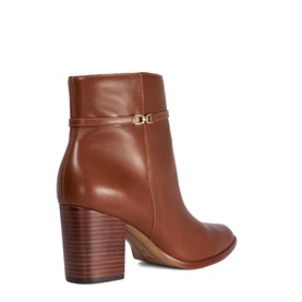 Tan leather ankle boot with gold-tone buckle detail, stacked block heel, and natural wood-effect sole, shown from rear angle.