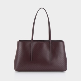 Calvin Klein tote bag in Fudge AOP monogram print, twin shoulder straps, structured silhouette with clean base, no visible hardware.
