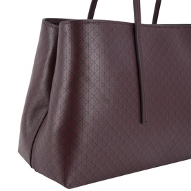 Calvin Klein tote bag in Fudge AOP, featuring embossed monogram pattern, structured silhouette, and twin top handles