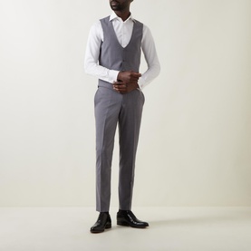 Model wearing Remus Luca Single-Breasted Waistcoat in grey with white shirt and grey trousers, styled with black leather shoes.