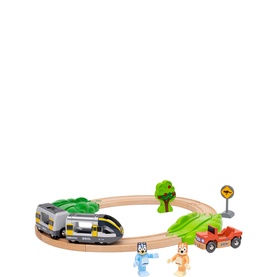 Brio Smart Tech Sound Travel Set with wooden oval track, grey train, red car, two figures, and tree accessories