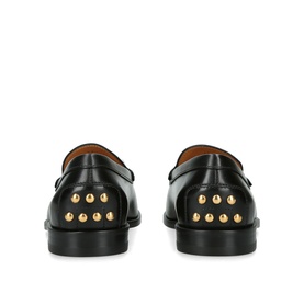 Black leather loafers with gold dome studs on heel, tan leather lining, shown from rear angle
