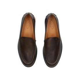 Tod's brown leather loafers with tan leather lining, moccasin toe stitching and rubber sole, overhead view