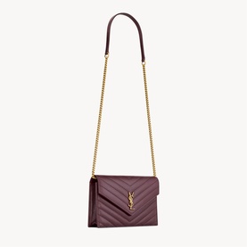 Saint Laurent quilted envelope bag in hot wine with gold-tone chain strap and monogram YSL clasp