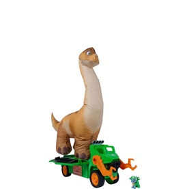 Paw Patrol multi-coloured dinosaur transport toy set featuring large brown brachiosaurus figure, green truck, and small dino character