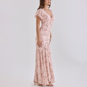 Model wearing House of CB Pink Vintage Rose floral maxi dress with flutter sleeves, deep V-neckline, and fitted mermaid silhouette