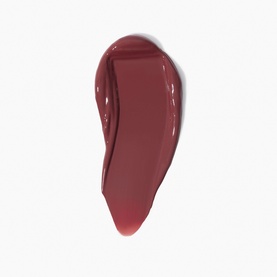 Kash Beauty Blush swatch in deep berry-red, shown as a glossy teardrop-shaped smear on white background.