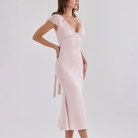 Model wearing House of CB Crystal Pink midi dress with lace cap sleeves, deep V-neck, fitted silhouette and side tie detail