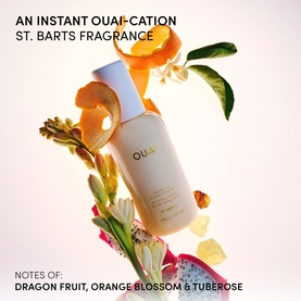 Ouai St. Barts Leave-In Conditioner bottle surrounded by orange blossom, tuberose and dragon fruit botanicals on white background.