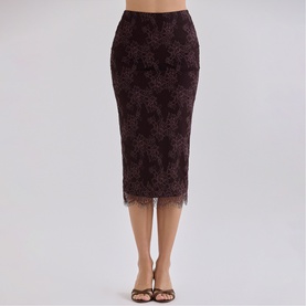 Model wearing House of CB chocolate brown lace midi pencil skirt with scalloped hem, styled with brown heeled sandals.