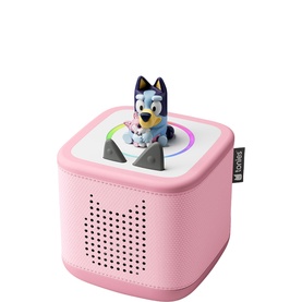 Tonies Toniebox in pink with Bluey character tonie figure on top, rainbow LED light ring visible, compact cube speaker design