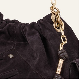 Bash purple suede slouch bag with gold chain strap, knotted leather tassel detail and embossed logo patch