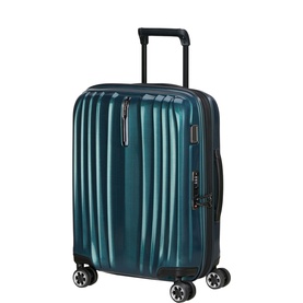 Samsonite hard-shell cabin suitcase in Deep Petrol with ribbed texture, retractable handle, and four spinner wheels