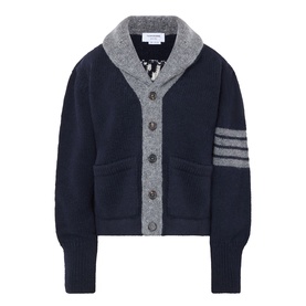 Thom Browne navy wool cardigan with grey shawl collar, contrast 4-bar stripe sleeve, and front patch pockets