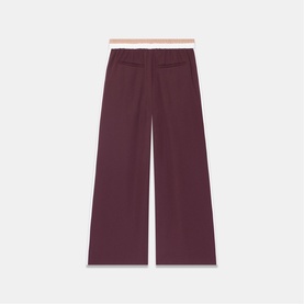 Mint Velvet red wide-leg trousers with contrast blush waistband, flat lay back view