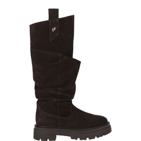 Steve Madden brown suede knee-high boots with ruched shaft, chunky lug sole, and silver logo hardware detail.