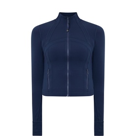 Navy blue zip-up fitted performance jacket with high collar, raglan sleeves, and side zip pockets