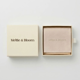 Mettle & Bloom necklace in silver presented in a cream gift box with branded blush pink inner tray.