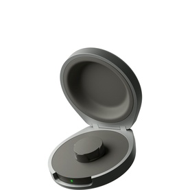 Oura Ring 5 Portable Charger in dark grey, open clamshell case with green indicator light and circular charging dock visible