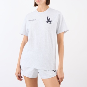 Model wearing Sporty and Rich heather gray LA Dodgers graphic T-shirt, styled with matching gray shorts.