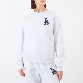 Model wearing Sporty and Rich Heather Gray Navy LA logo crew neck sweatshirt, styled with matching gray sweatpants.